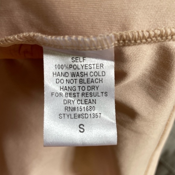 Beautiful White and Cream dress with Cutouts and lace up - Picture 6 of 6